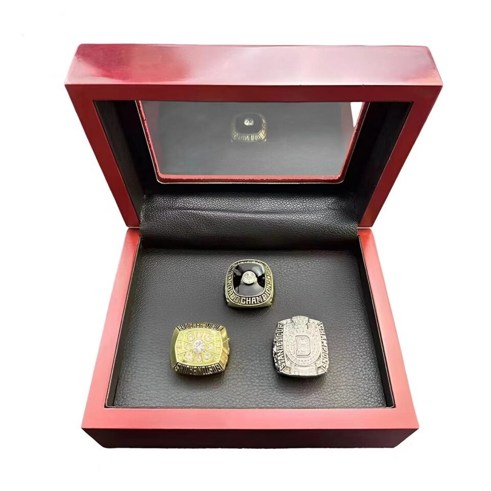 Three championship rings in display box.